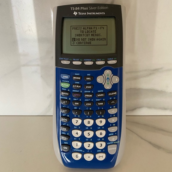 Texas Instruments T1-84 Plus Silver Edition Graphing Calculator - Picture 1 of 4